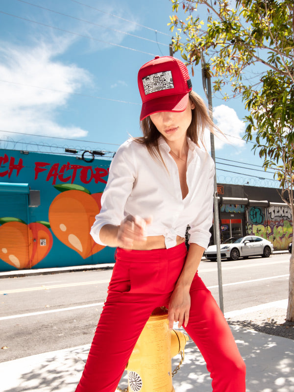 Woman  red pant business casual, white shirt long sleeves and red fashion trucker hat pop love white 