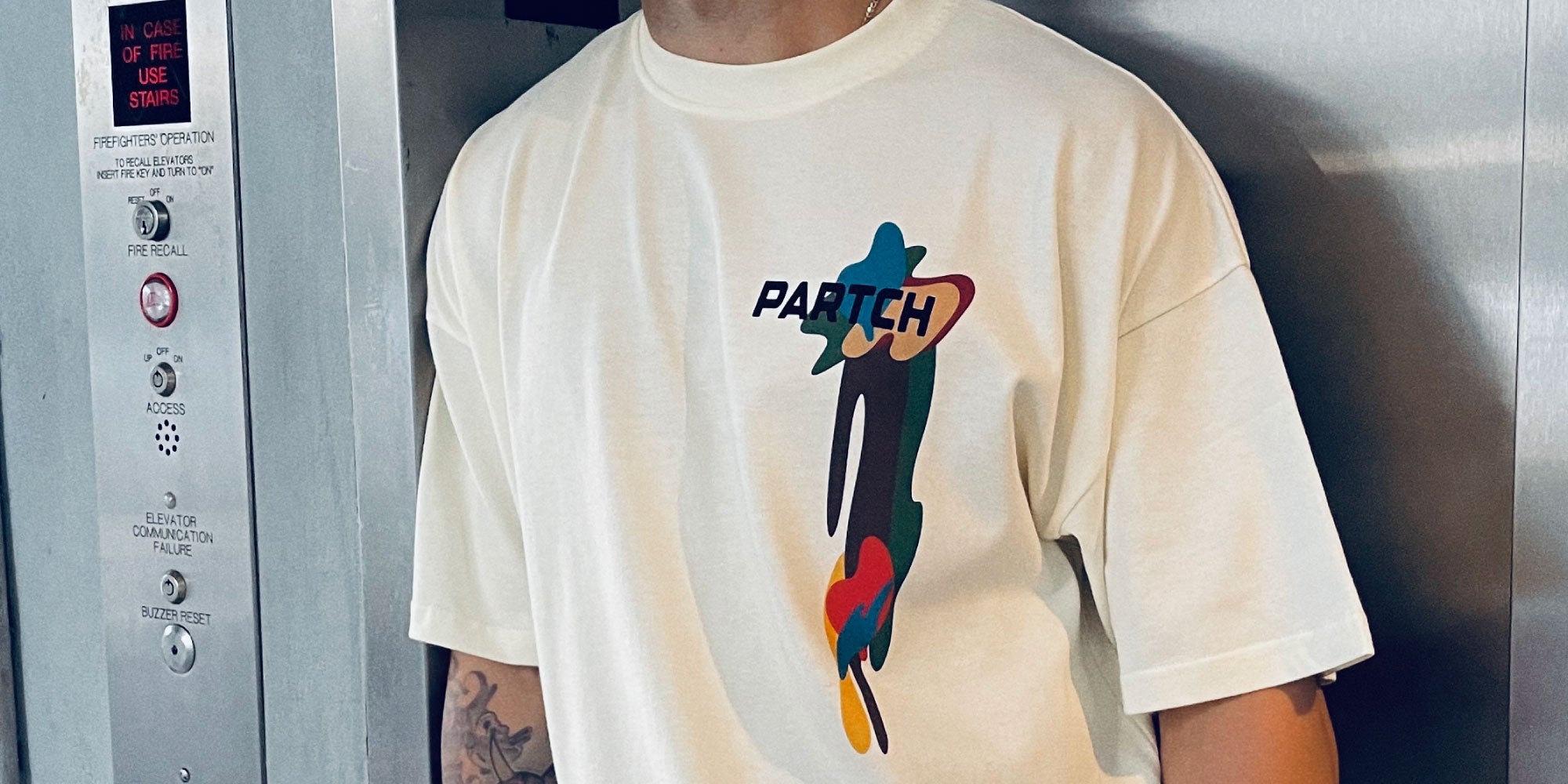 Luxury Graphic Oversized Tee Cream Drift Cotton Streetwear | PARTCH